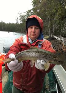 IFS Staff member Storm Eastley with brown trout from the Bradys Chain of Lakes