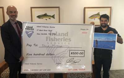 The Hon Guy Barnett MP, Minister for Primary Industries and Water with David Mossop, winner of the IFS 2019-20 Tasmanian Trout Fishing Photo Competition.