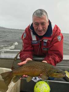 IFS staff member, Rob Freeman, with a Blackmans Lagon brown trout