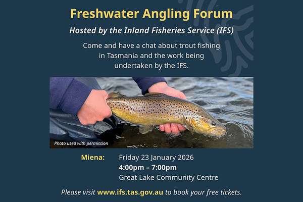A photo of a man holding a brown trout with printed details of an event
