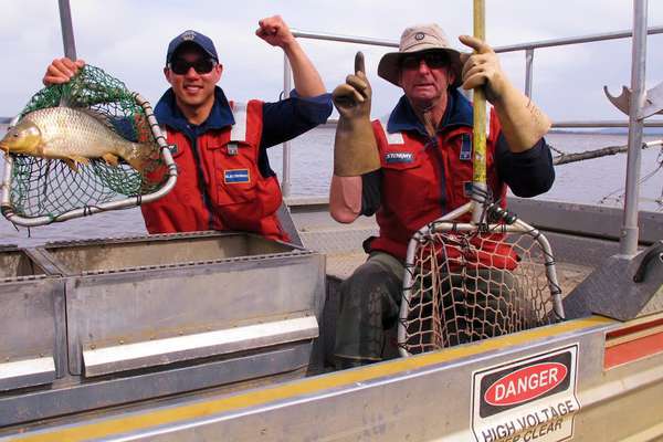 The Hon Guy Barnett, Minister for Primary Industries and Water for the Tasmanian Liberal Government, share a celebration of success of 25 years of the Inland Fisheries Service Carp Management Program.