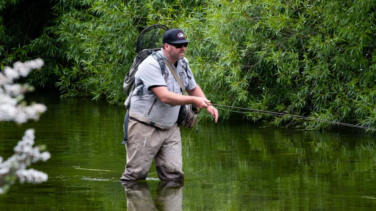 Steve Starling holding a rainbow trout