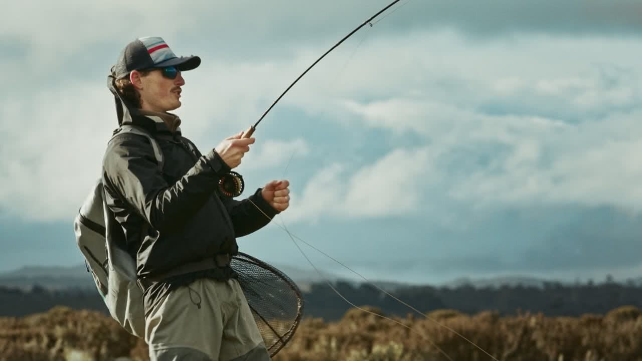 Steve Starling holding a rainbow trout